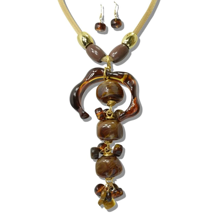 SCULPTED ORGANIC RESIN PENDANT AND MESH CHAIN NECKLACE