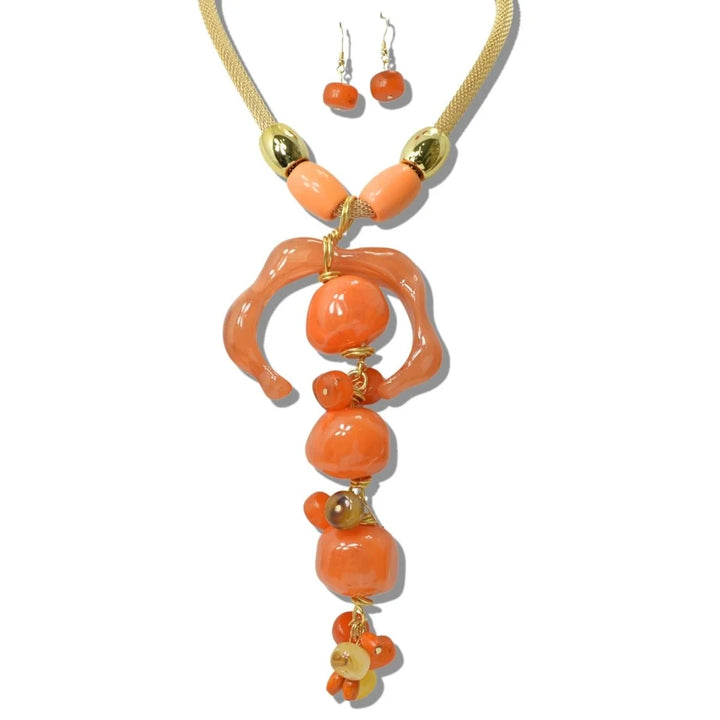 SCULPTED ORGANIC RESIN PENDANT AND MESH CHAIN NECKLACE