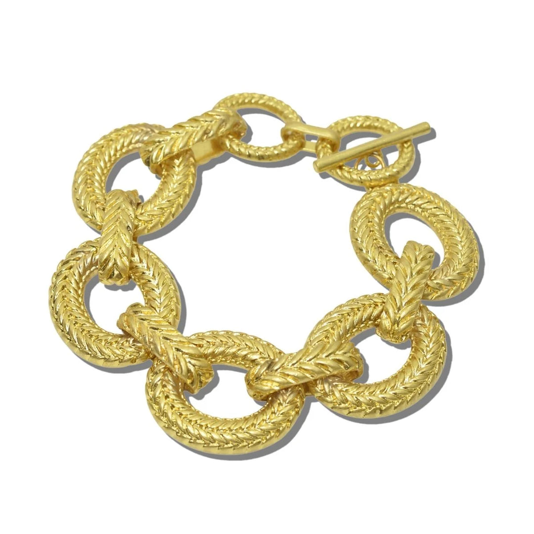 WATER RESISTANT 24K GOLD TONE CHEVRON BRAID AND TEXTURED LINK TOGGLE BRACELET